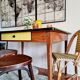 Old wooden farmhouse table and yellow formica top