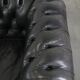 Set consisting of a cowhide leather Chesterfield sofa and matching ottoman