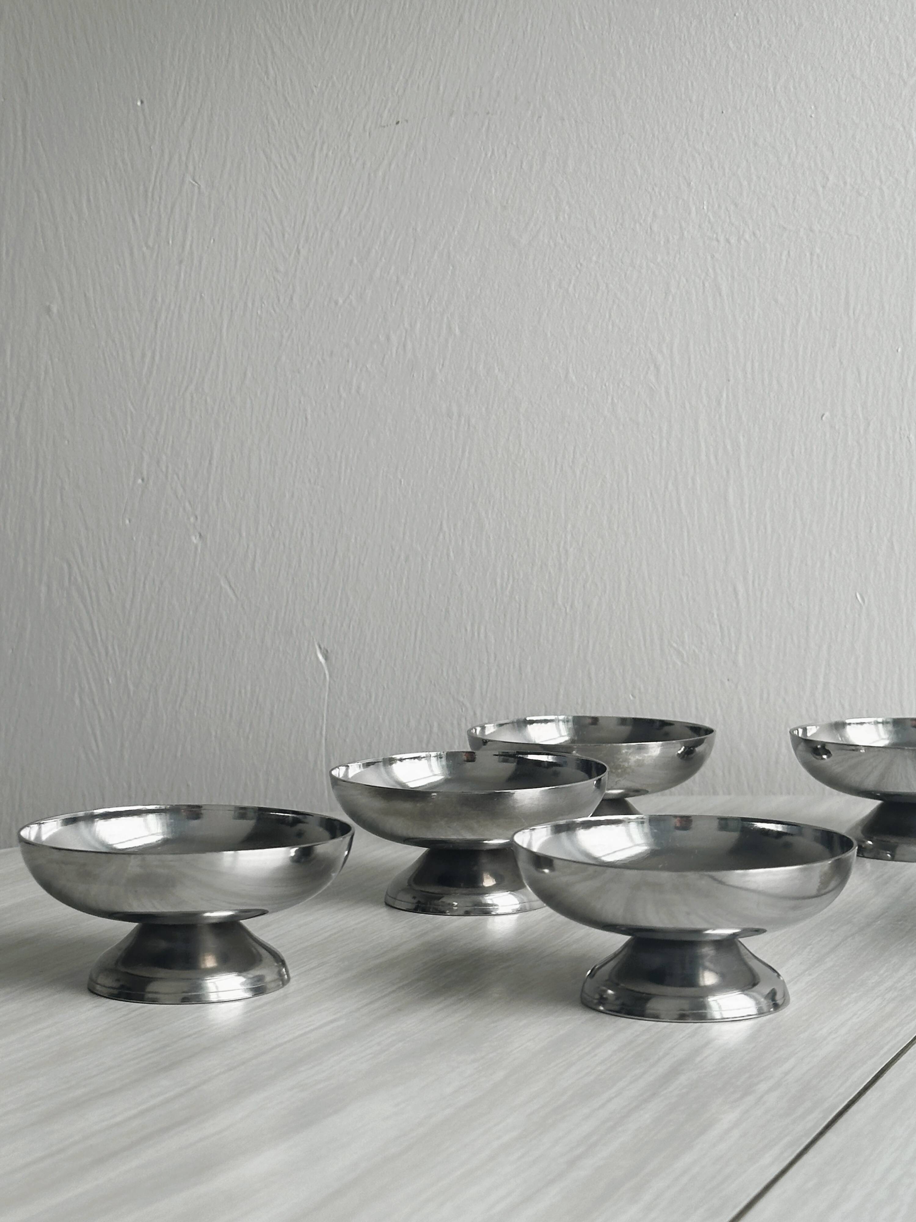 6 stainless steel dessert cups.