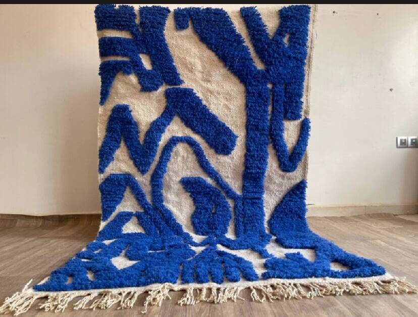 Wool rug with geometric patterns 200/300