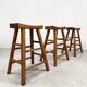 Brutalist vintage wooden curved bar stools