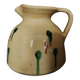 Vintage glazed terracotta ceramic jug from the 20th century.