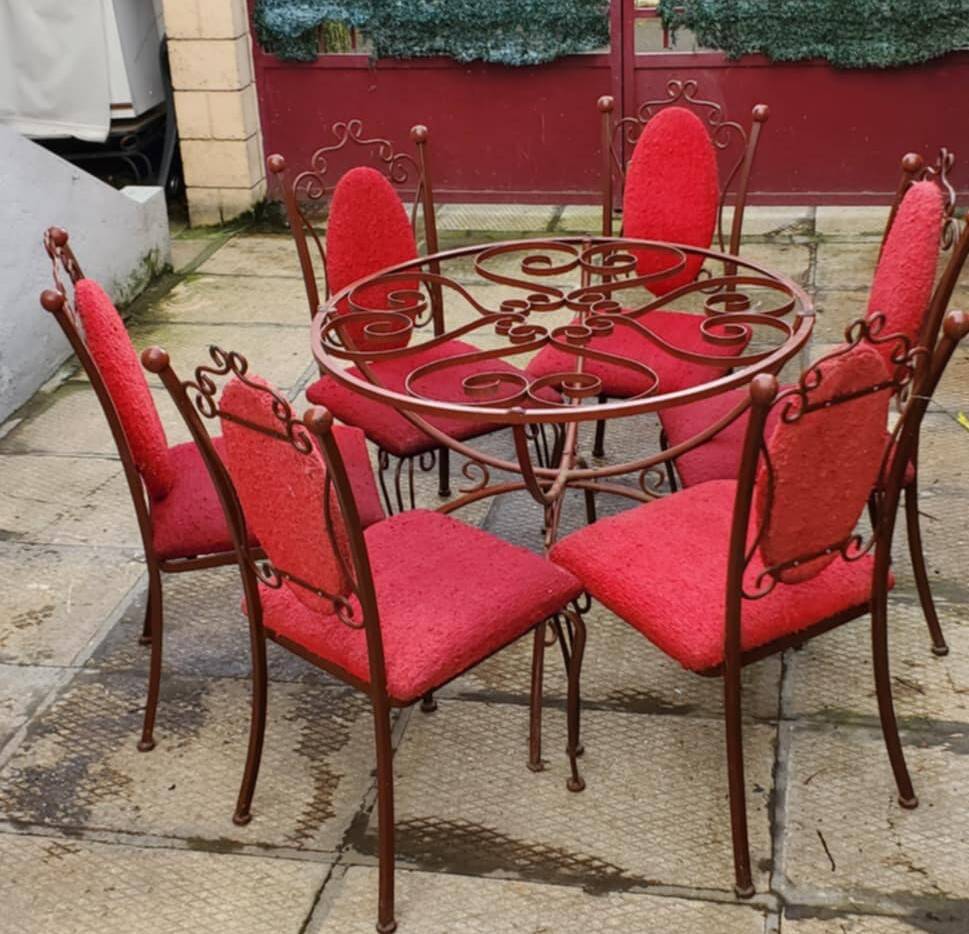 Lot of round table and 6 chairs in ironwork Raymond Menos Haiti