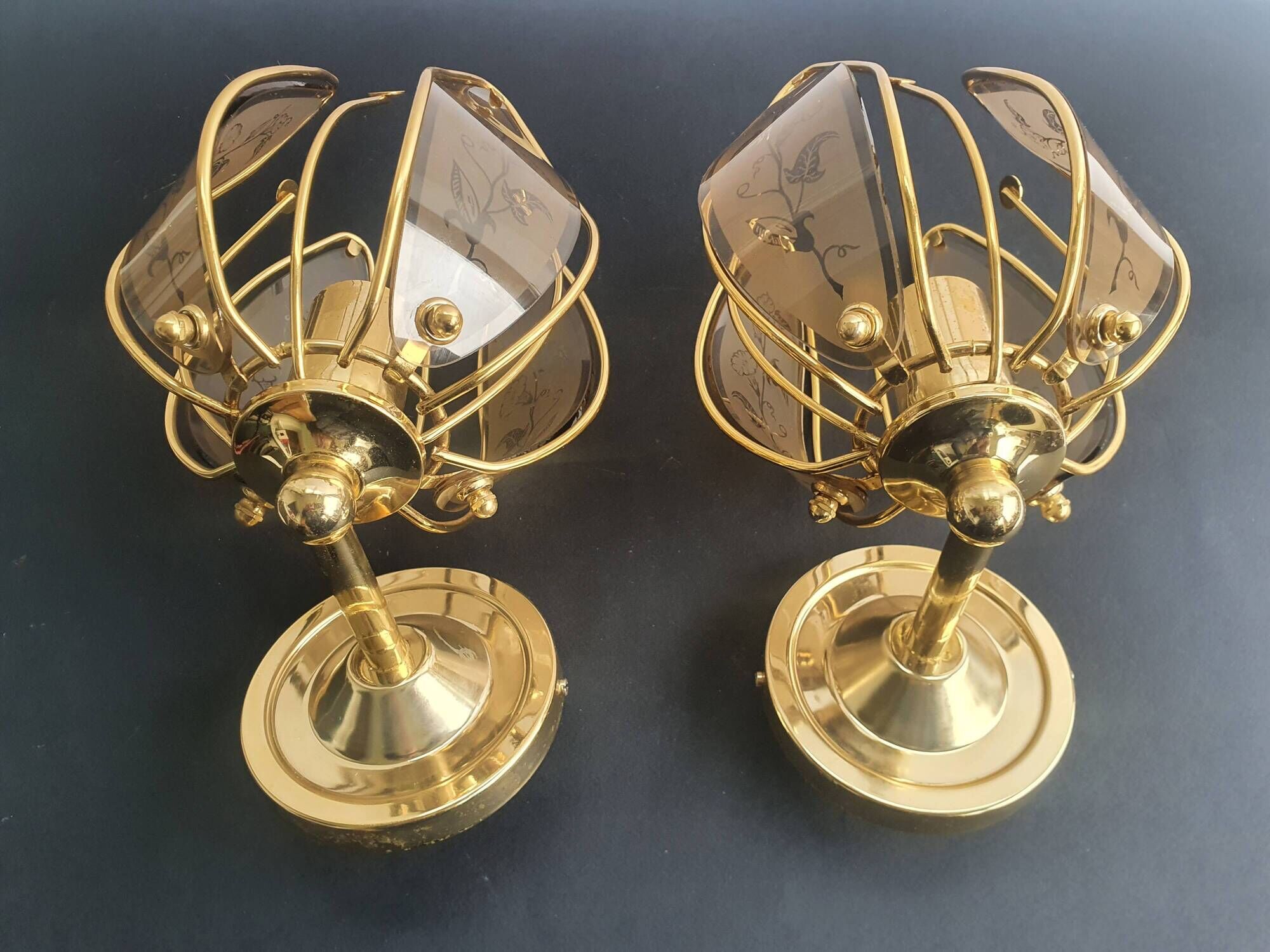 Pair of vintage brass wall sconces with glass shades