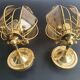 Pair of vintage brass wall sconces with glass shades