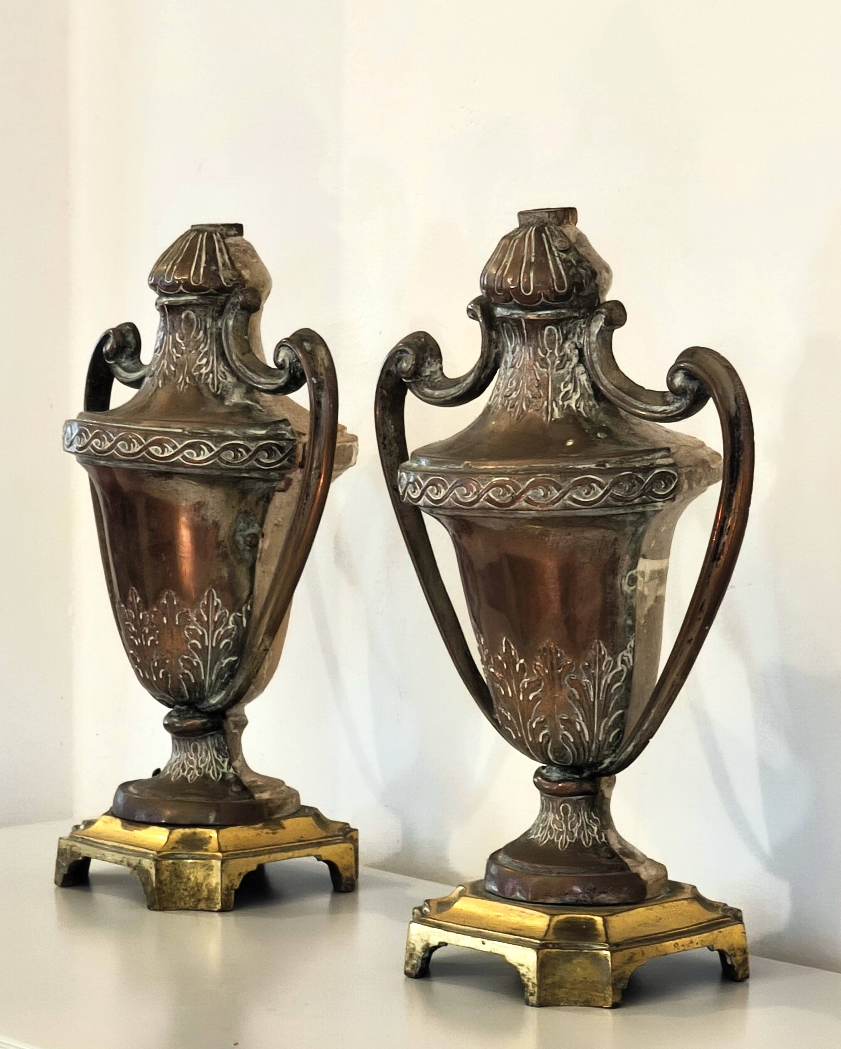 Pair of solid wood and bronze door handles, classical style, Italy 20th century.