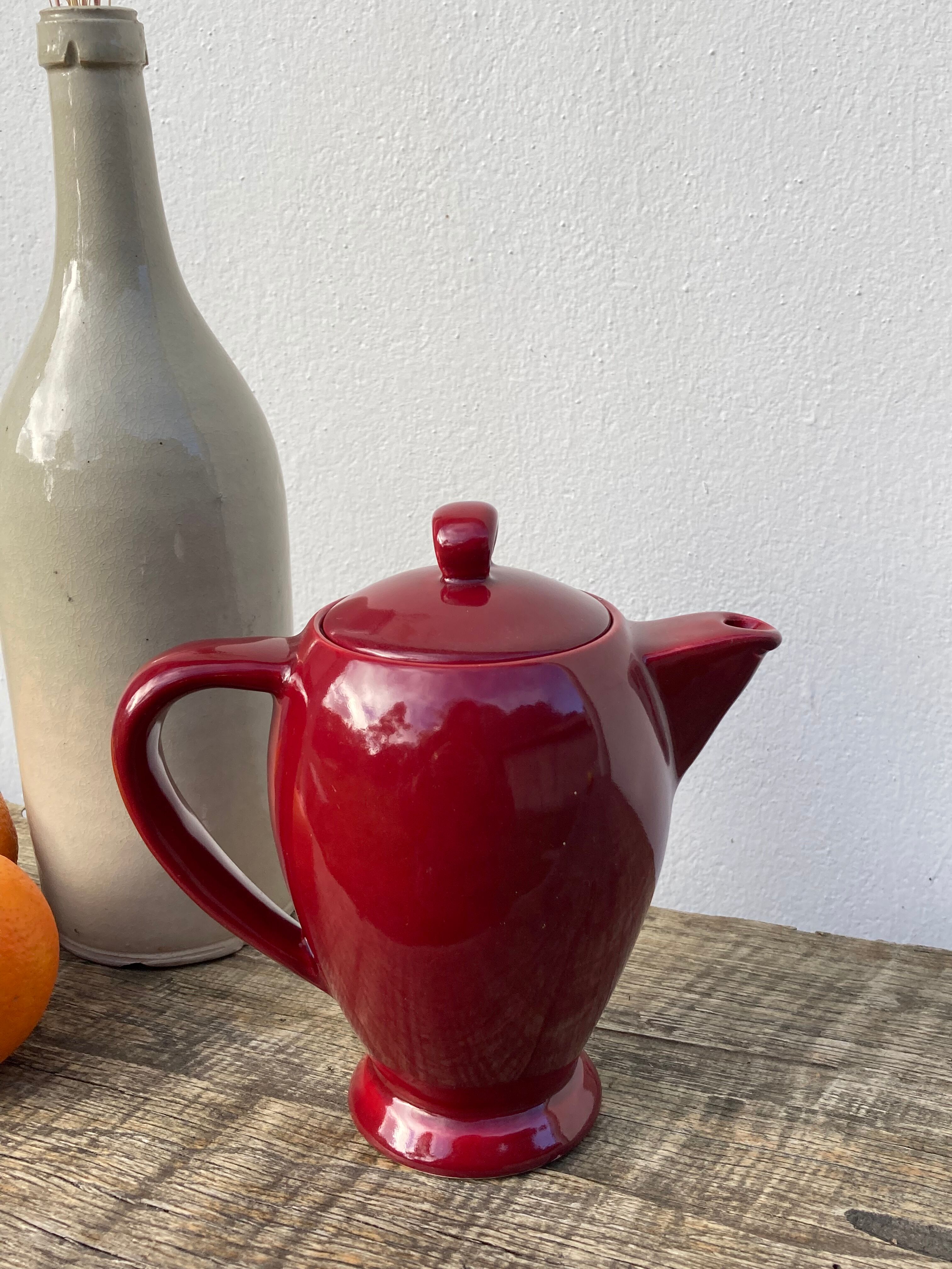 Vintage burgundy red teapot