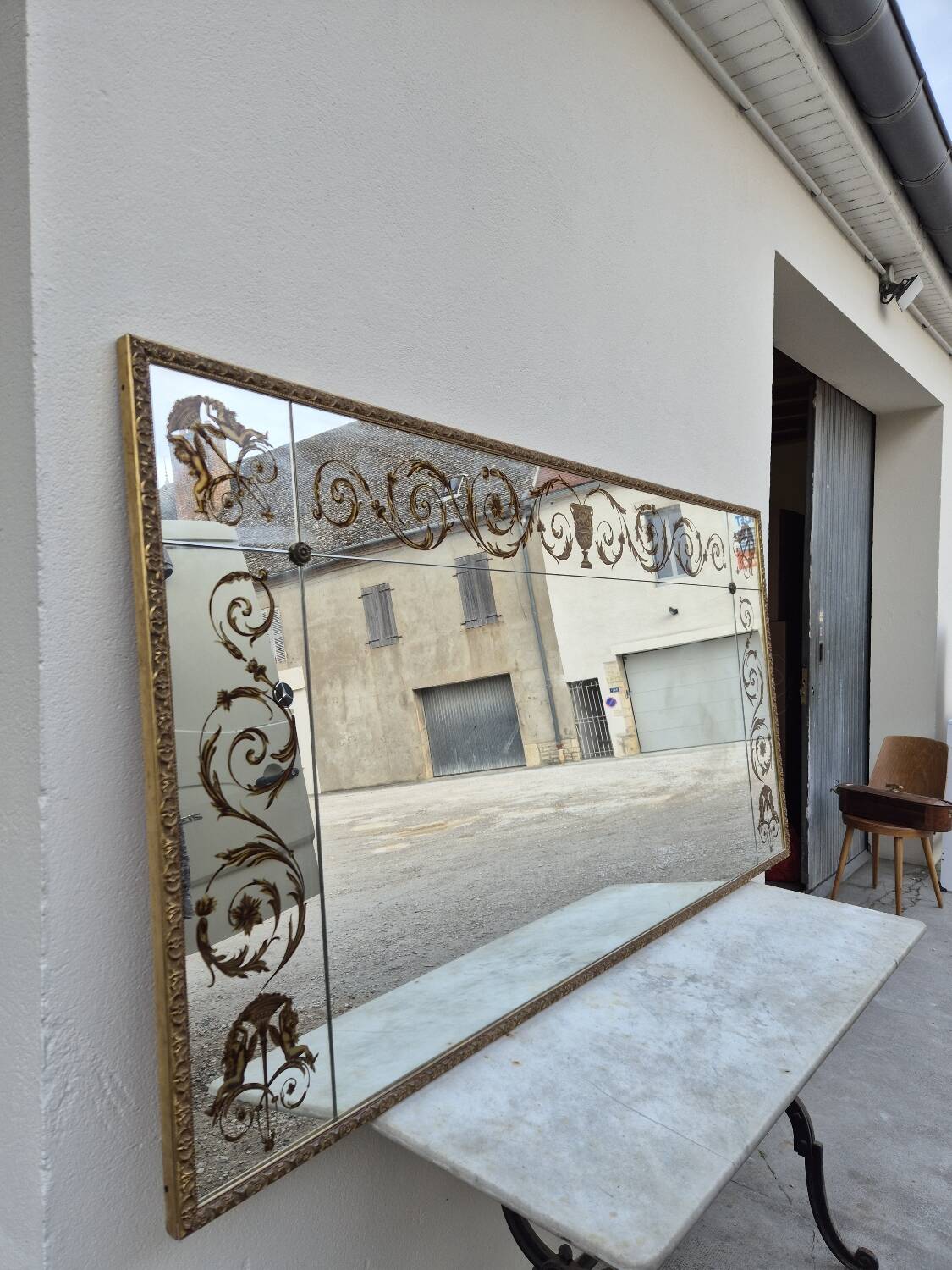 Antique gilded Venetian brasserie mirror in eglomised glass