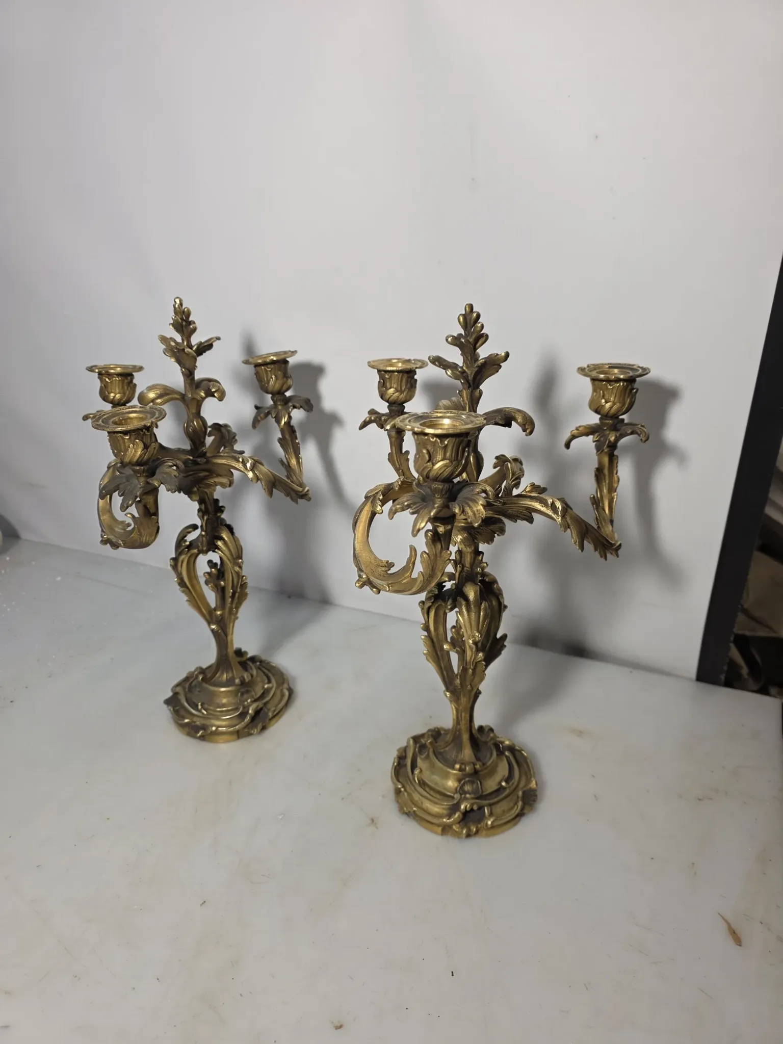 Pair of Louis XV style bronze candlesticks from the 19th century.