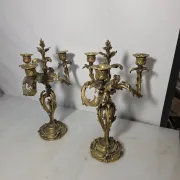Pair of Louis XV style bronze candlesticks from the 19th century.