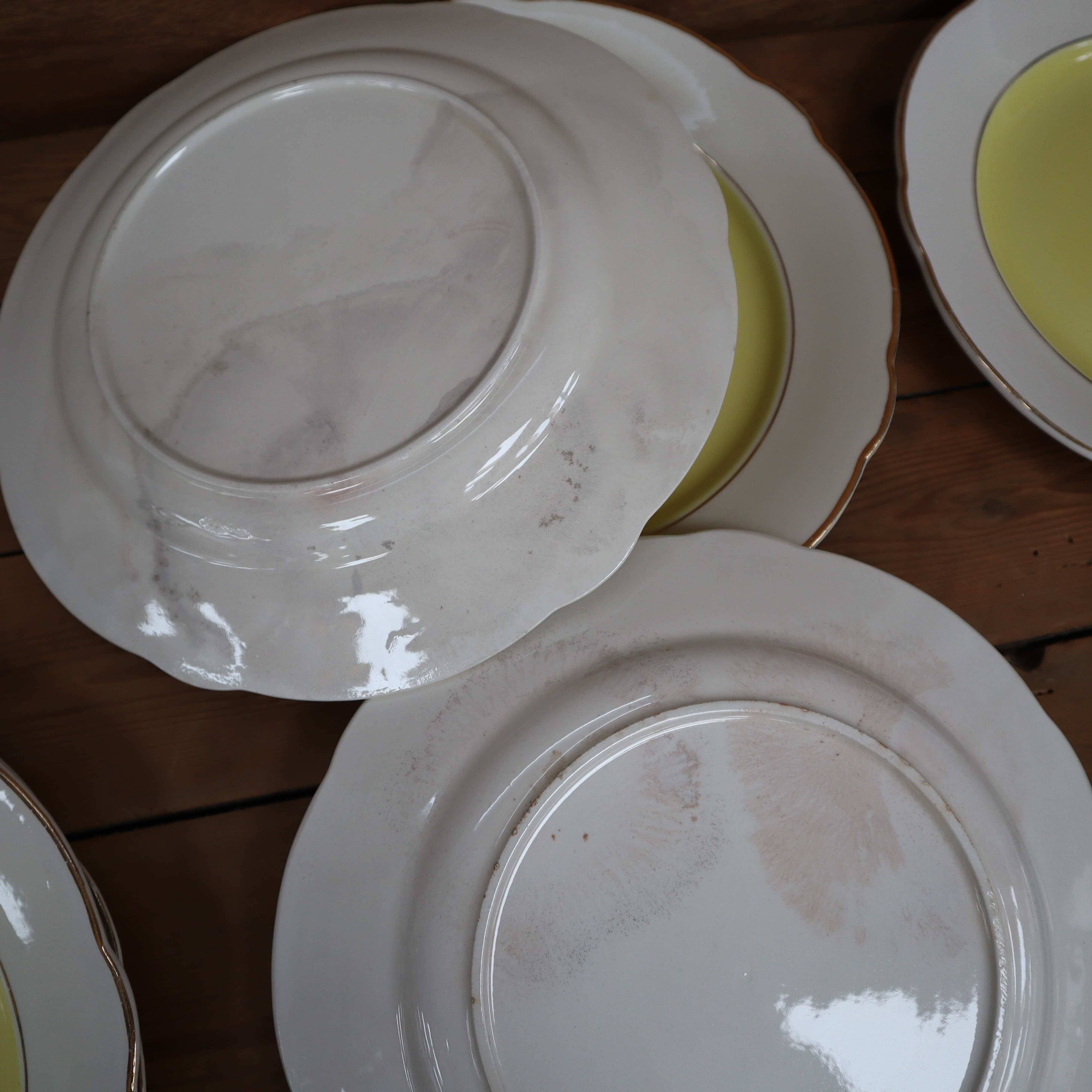 Set of 8 KG Lunéville yellow and white flat plates