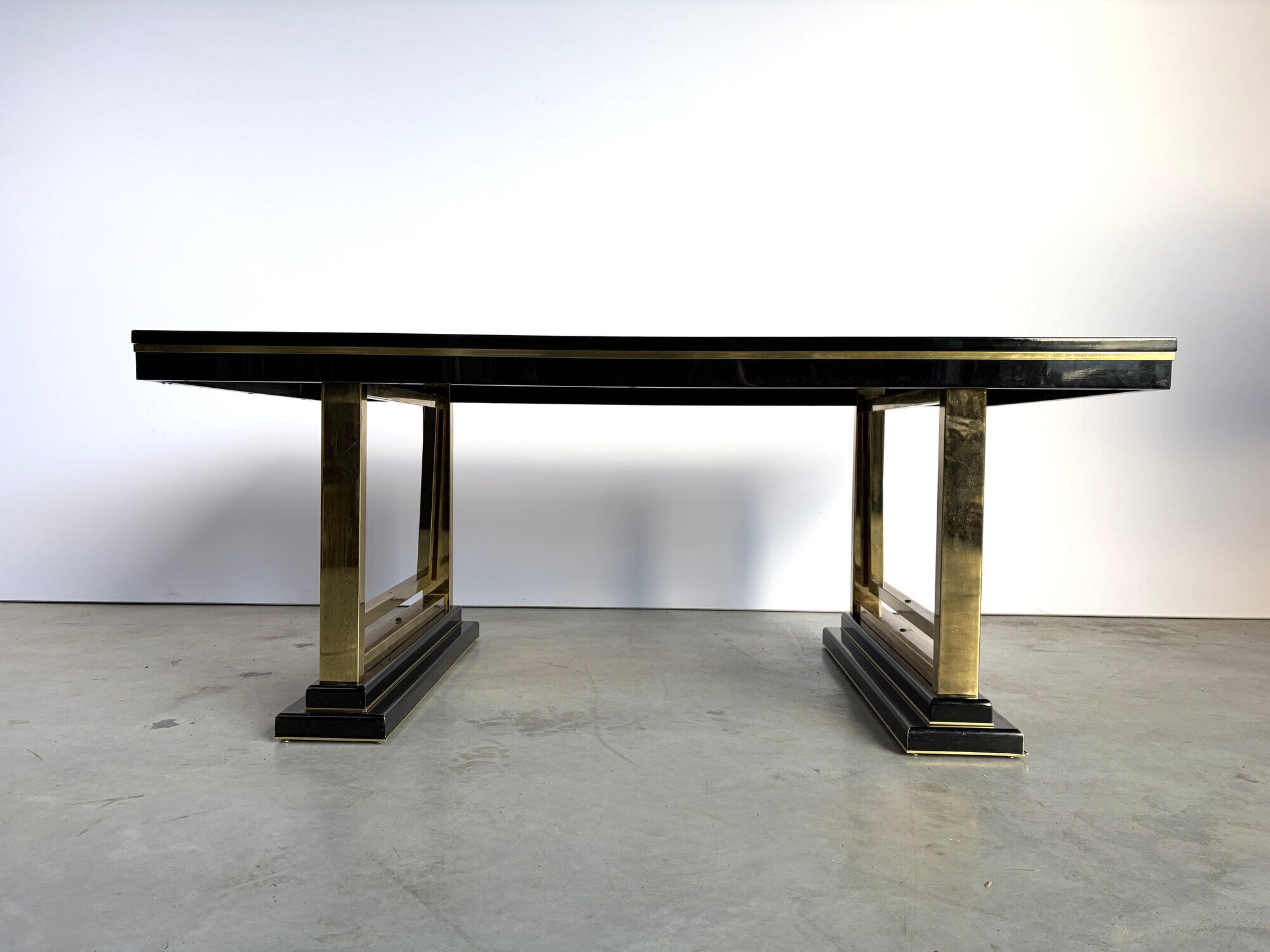 Vintage lacquer and brass dining table, 1970s