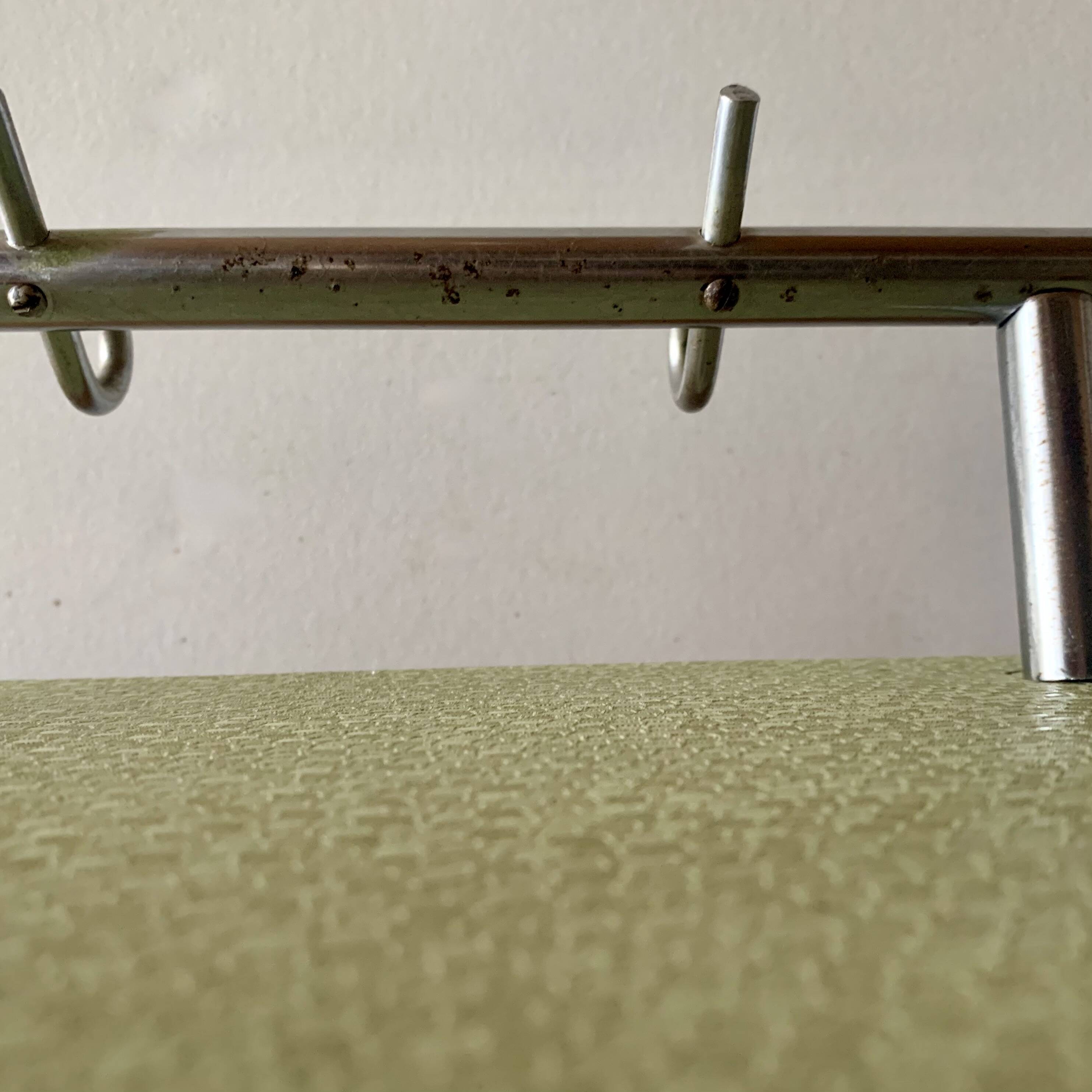 Large vintage wall-mounted coat rack in green Formica and chrome metal