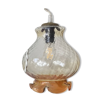 Vintage tulip-shaped portable lamp in transparent glass and gold.