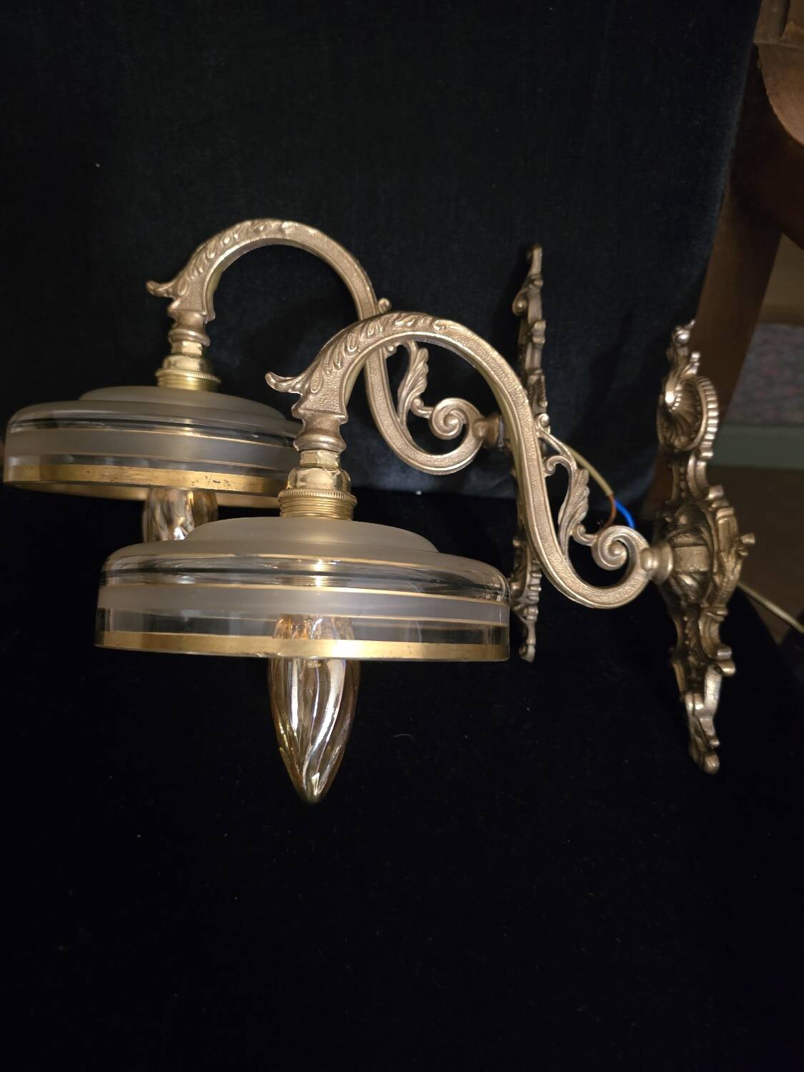 Brass wall sconces and Czechoslovak Art Deco globes