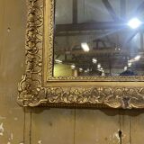 18th century Regency mirror in gilded wood