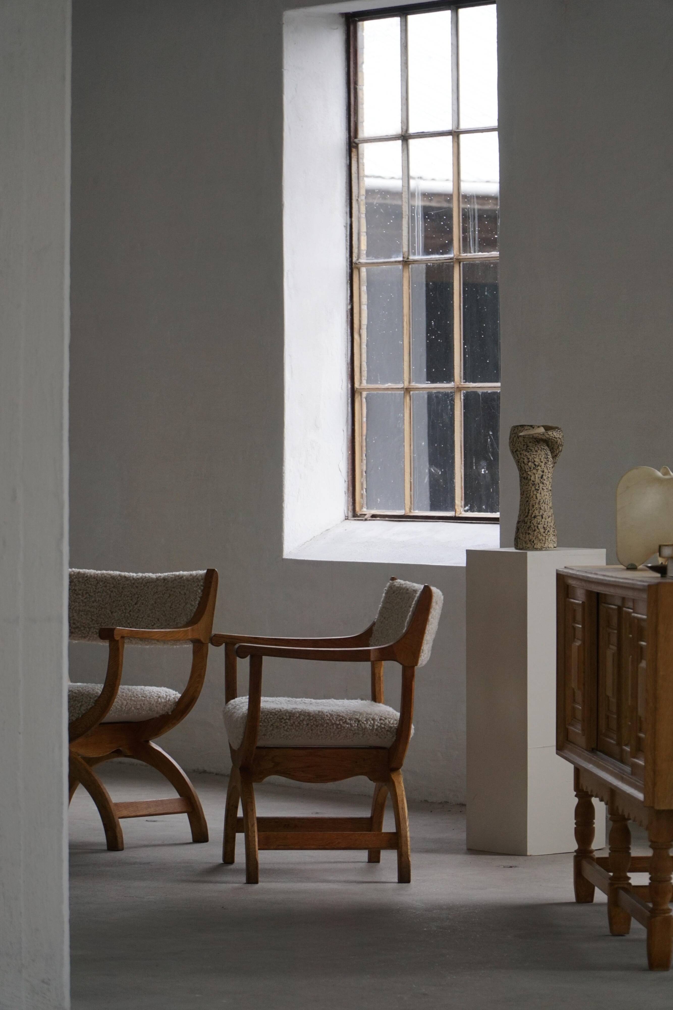 Henning Kjærnulf, Oak and lambswool armchair, "Kurul" model, Mid-century, 1960s