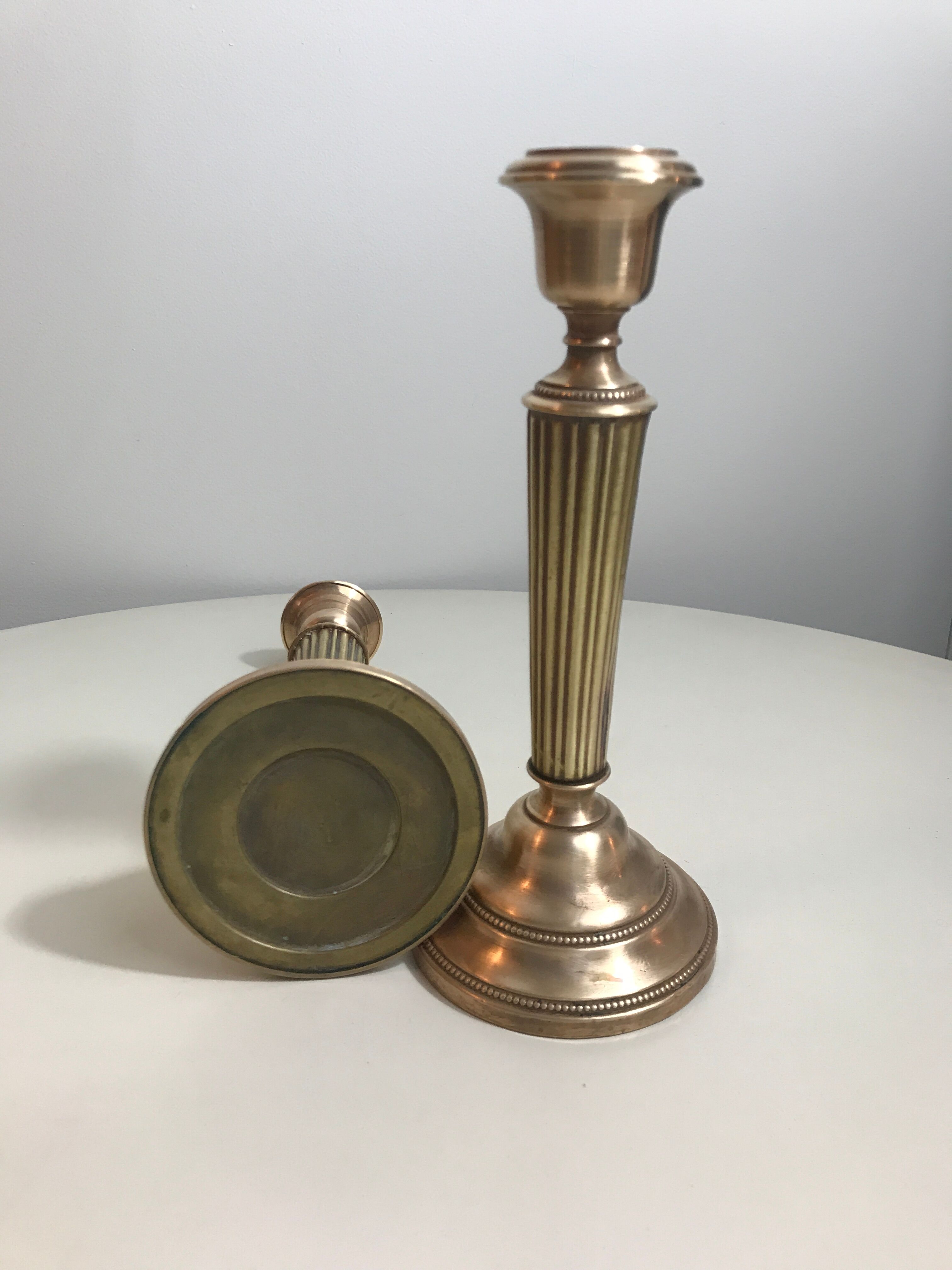 Pair of old brass candlesticks