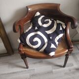 Armchair with canework and bronze detail