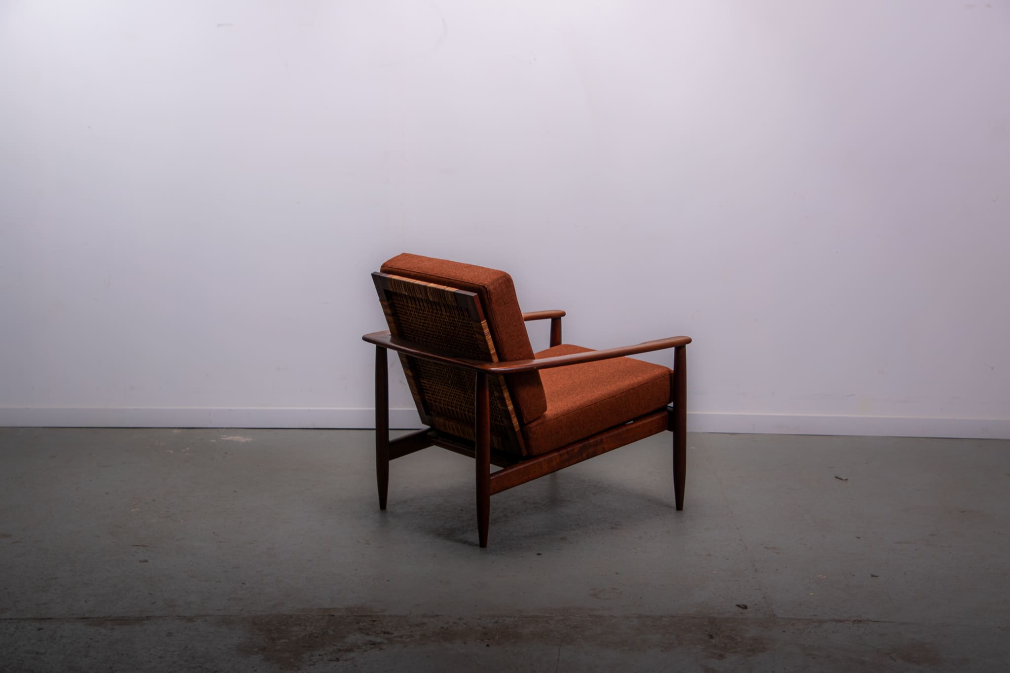 Mid-century easy chair in teak and cane circa 1970
