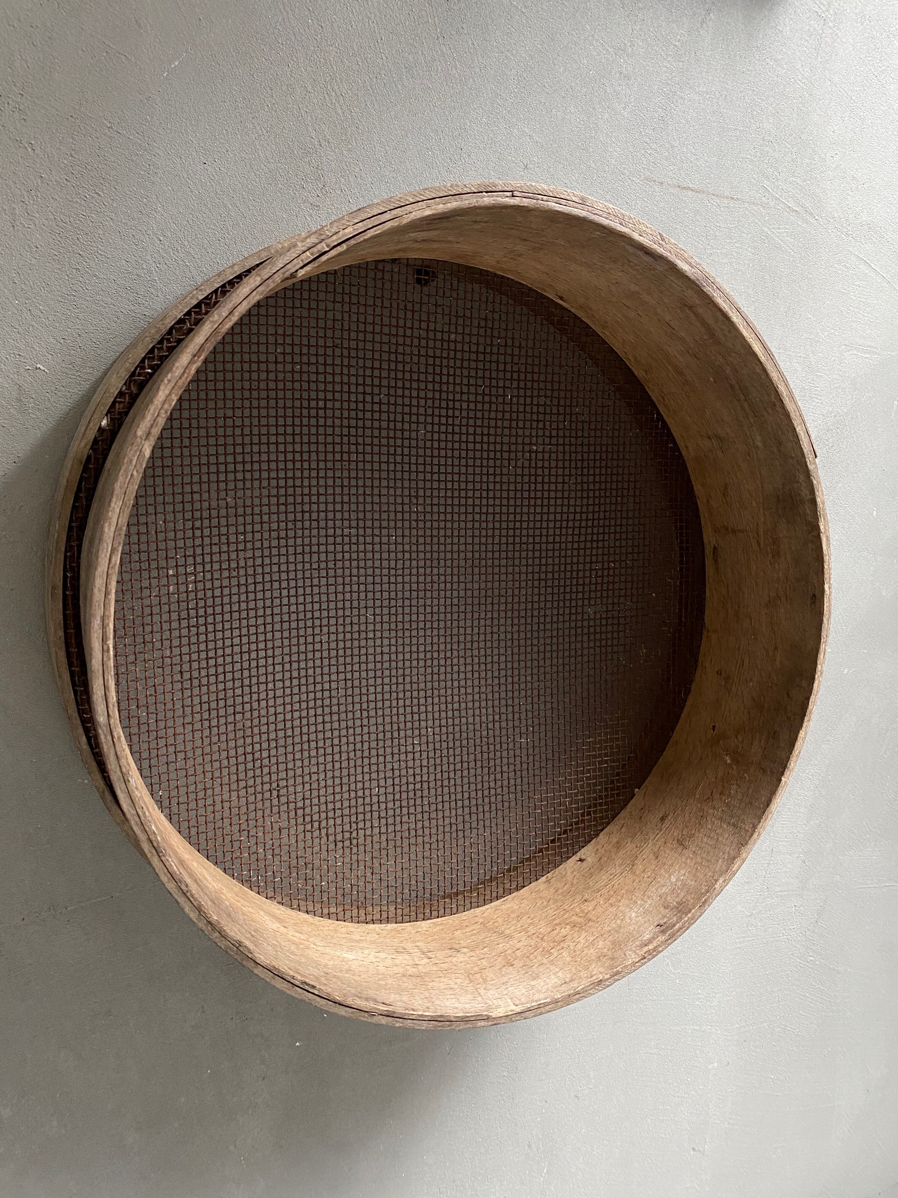 Old large wooden sieve