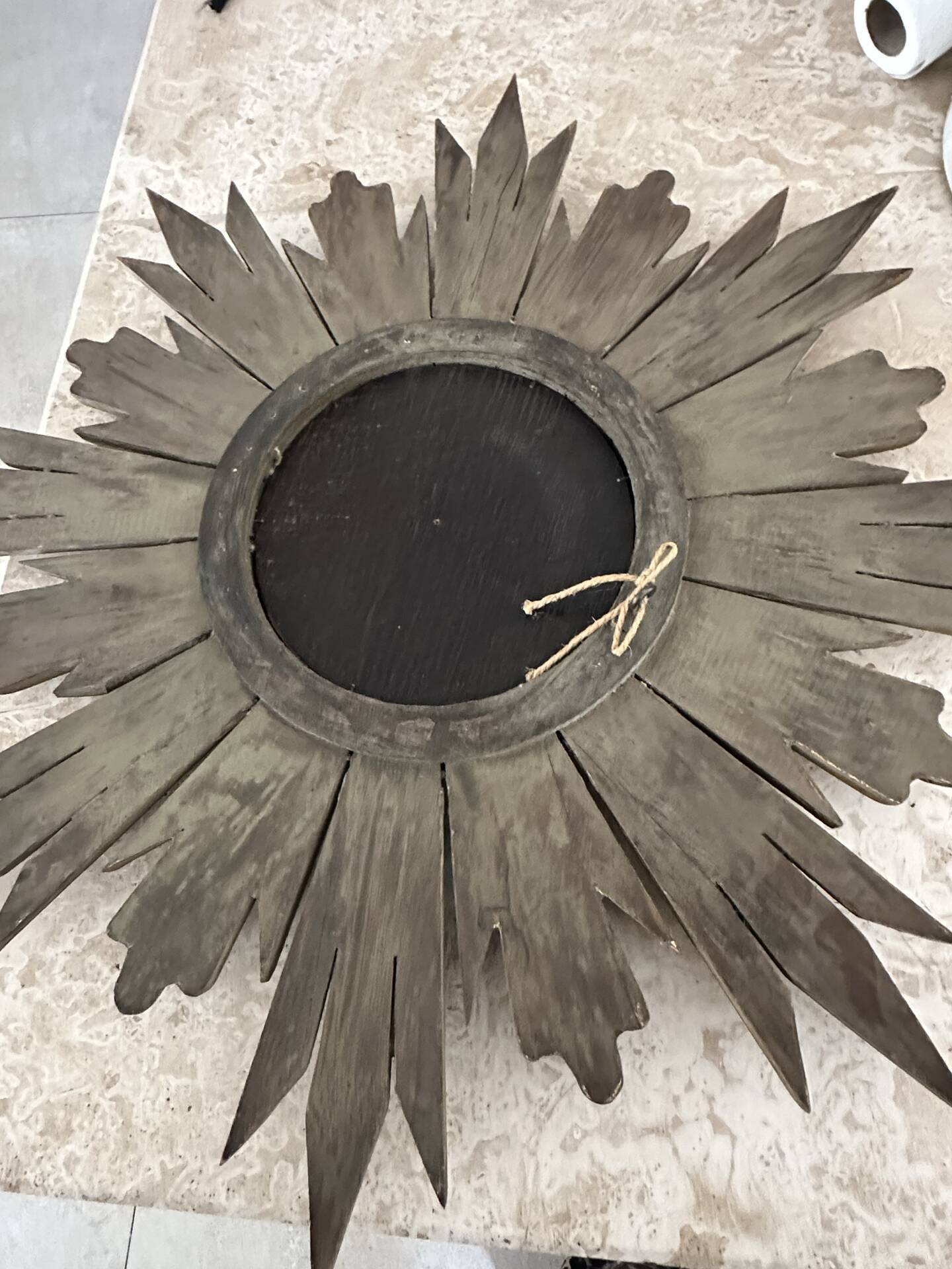 Large sun mirror in carved gilded wood.
