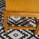 Pair of light wood chairs with post-formed seat and backrest.