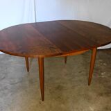 Table ronde en palissandre avec rallongedes années 70