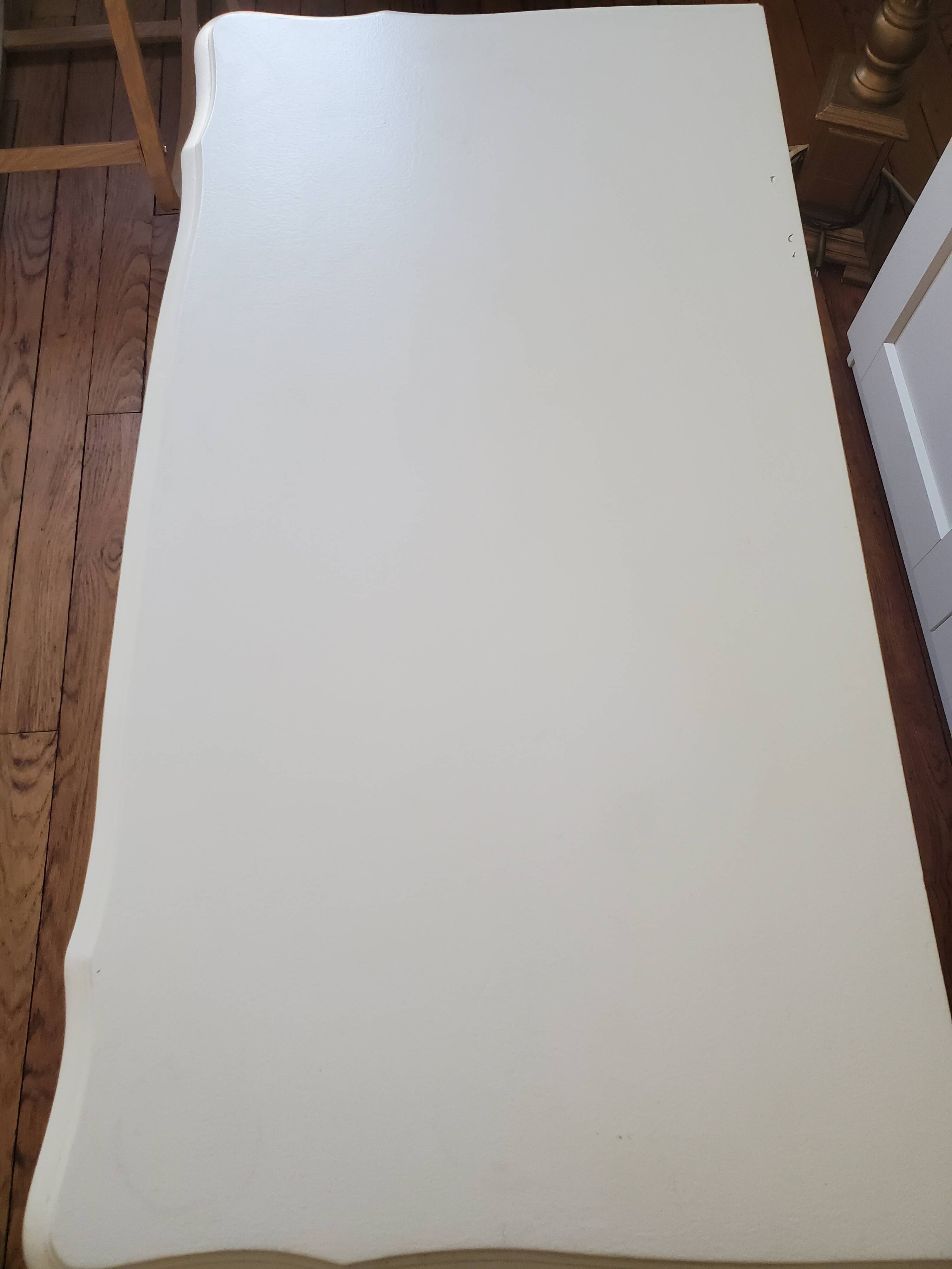 Dresser repainted in off-white and grey-pink colours.