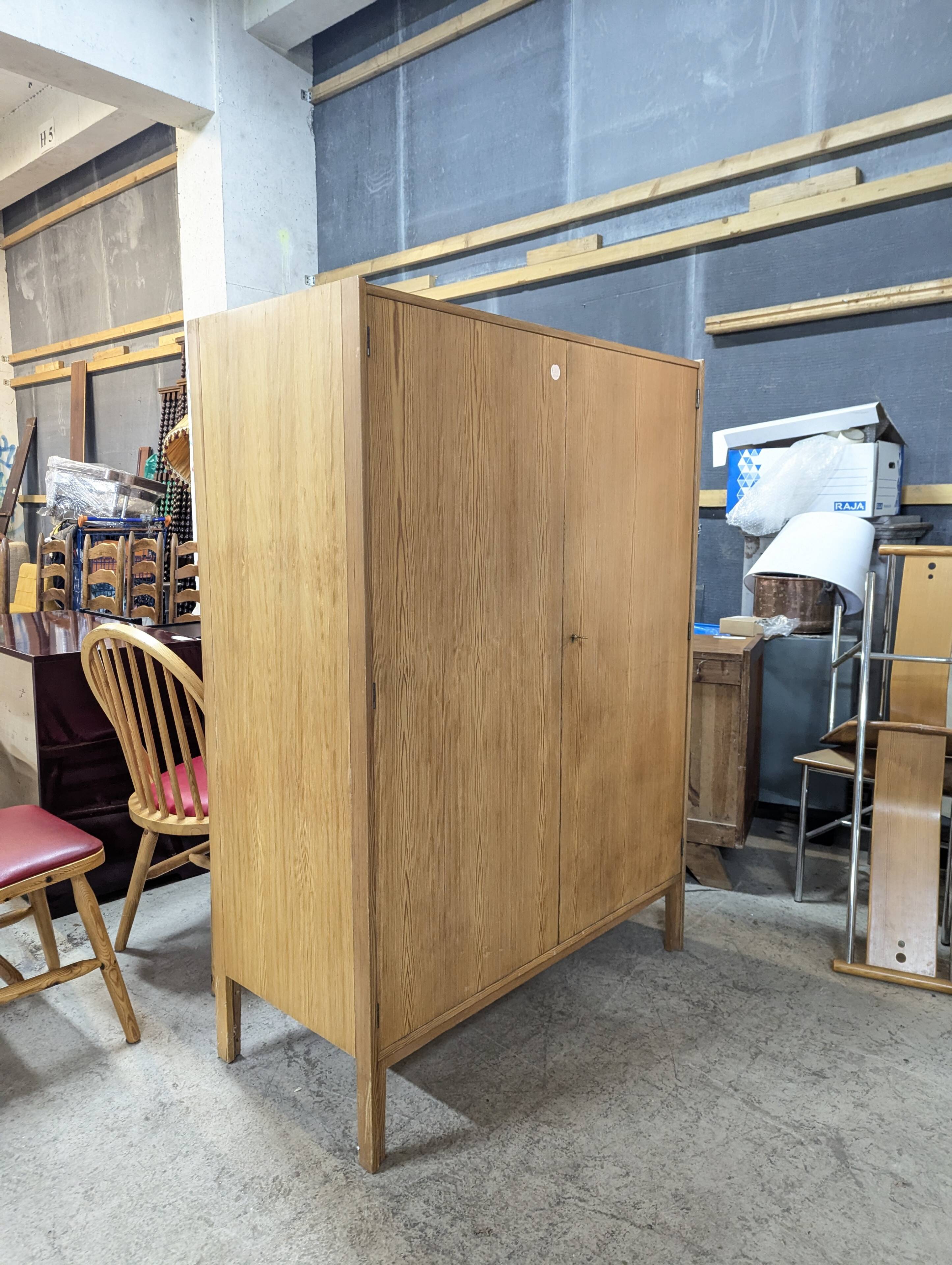 Modernist pine wardrobe from the reconstruction period.