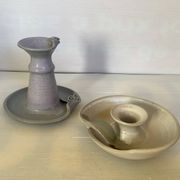 Pair of signed ceramic candlesticks