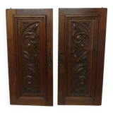 Paire d'anciens panneaux de porte en bois chêne sculpté