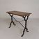Bistro table with an oak top on a cast iron base, 1930s.