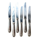 6 dessert knives by Christofle in silver-plated metal, shell decoration.