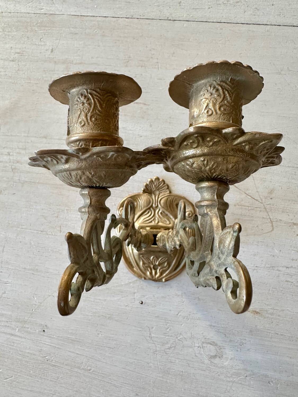 Pair of brass wall candle holders