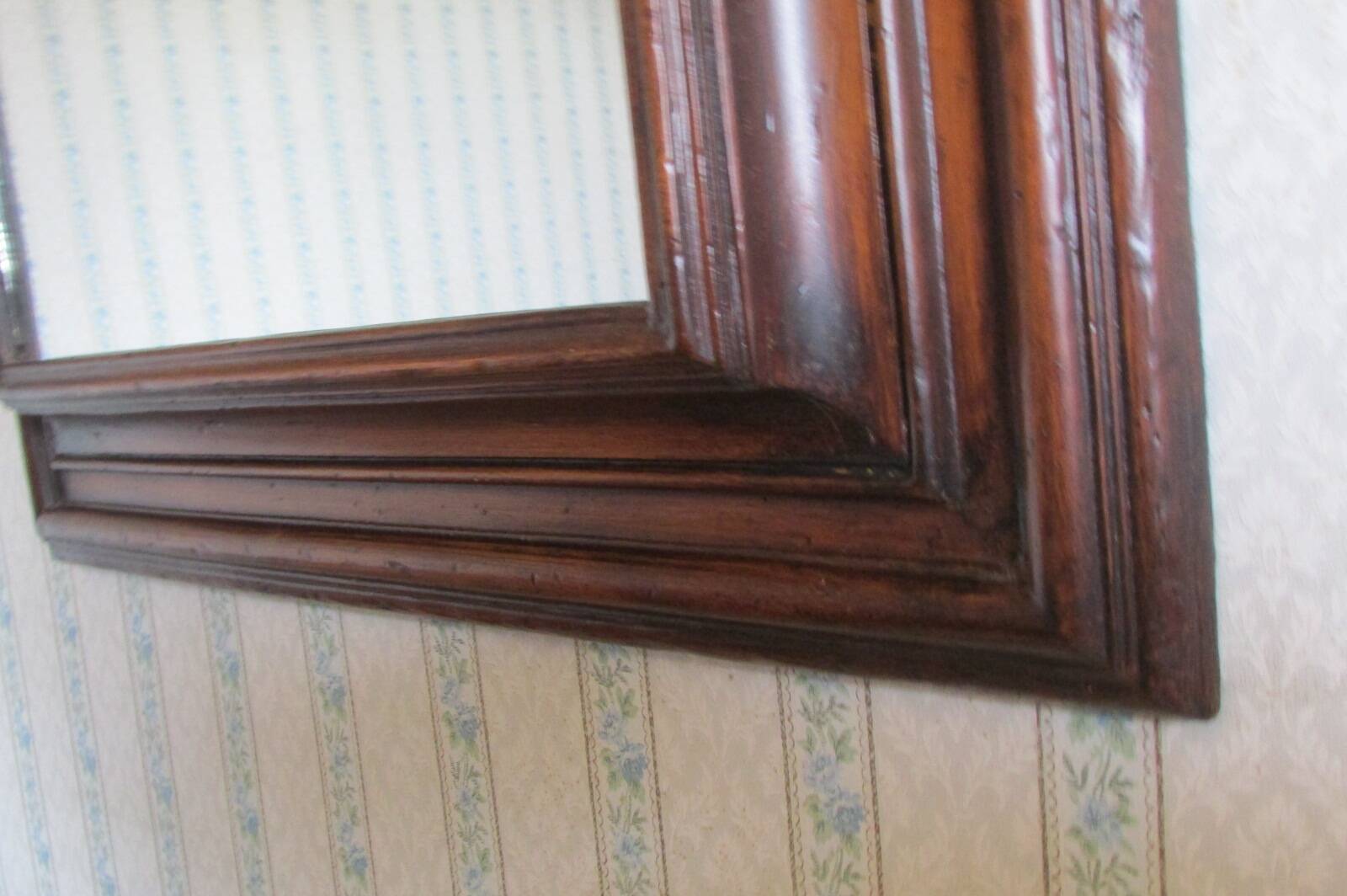 Large mirror in natural stained wood