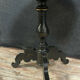 Guéridon NAPOLÉON III in blackened wood resting on a tripod foot.