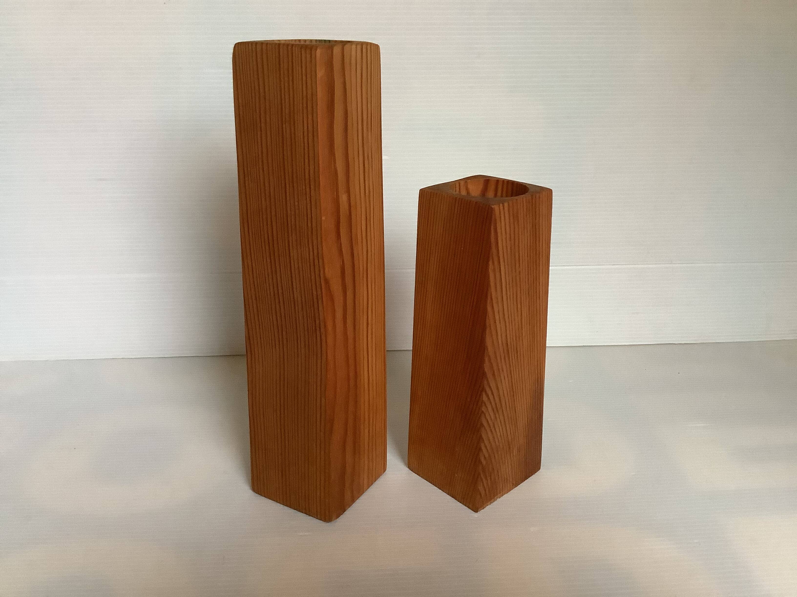 Pair of asymmetrical Scandinavian wooden candlesticks