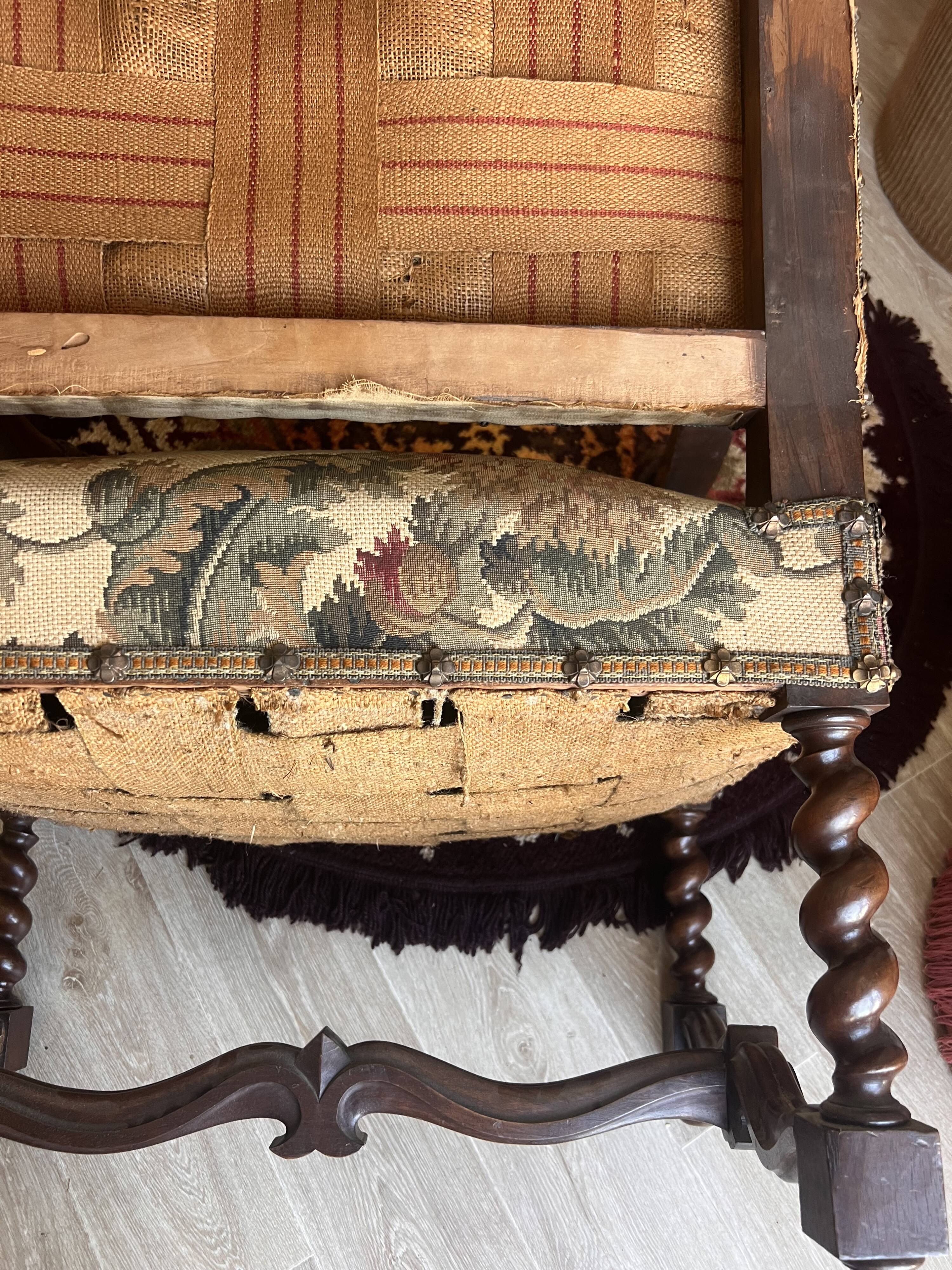 Antique armchair in Henri II style with masks