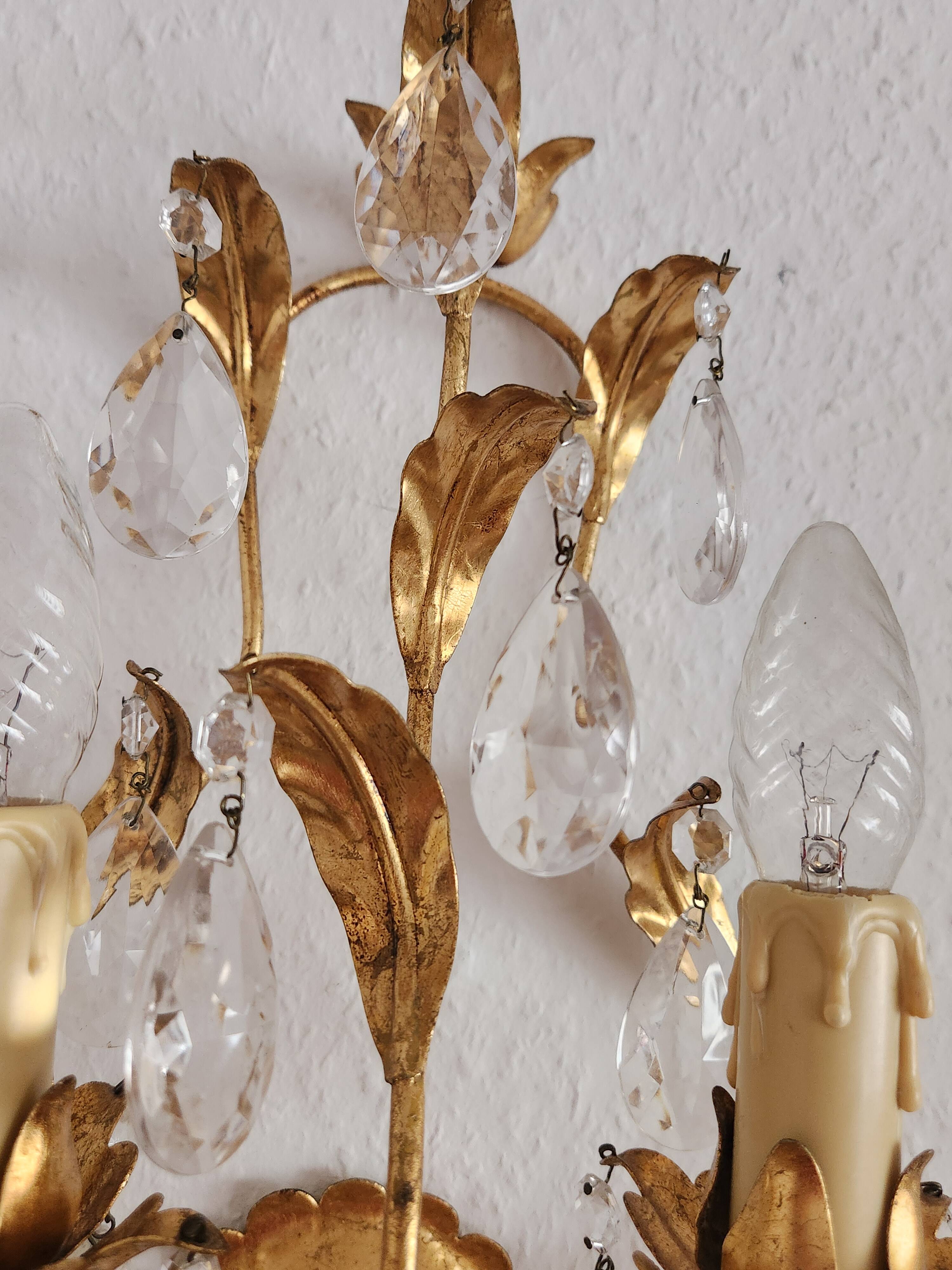 Hand-forged wall lamp gilded with gold leaf and crystals, Italy