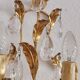 Hand-forged wall lamp gilded with gold leaf and crystals, Italy