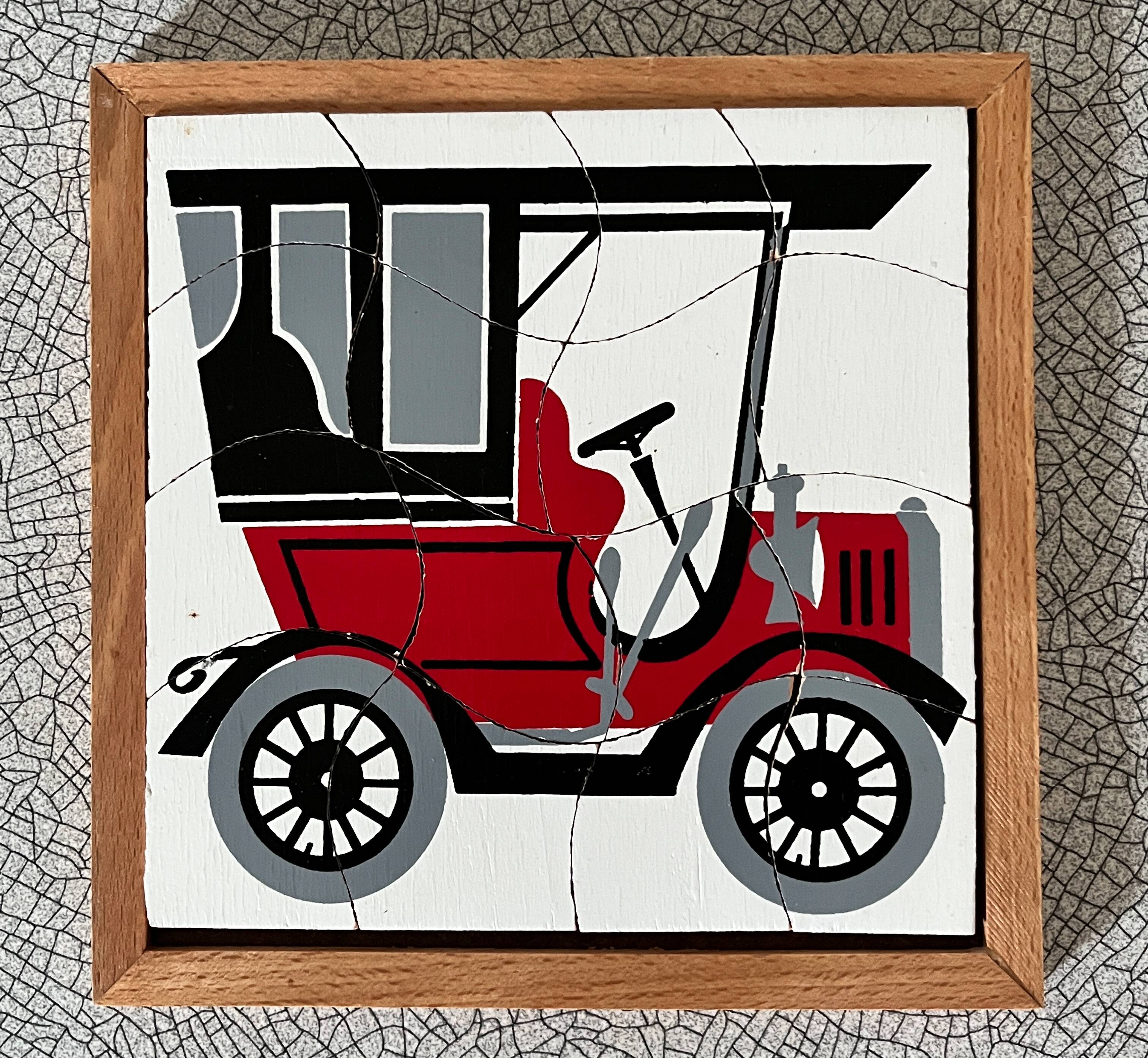 Wooden frame puzzle from the 60s/70s depicting a vintage car.