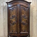 Bressane wardrobe of Louis XV period in walnut and walnut magnifying glass 18th