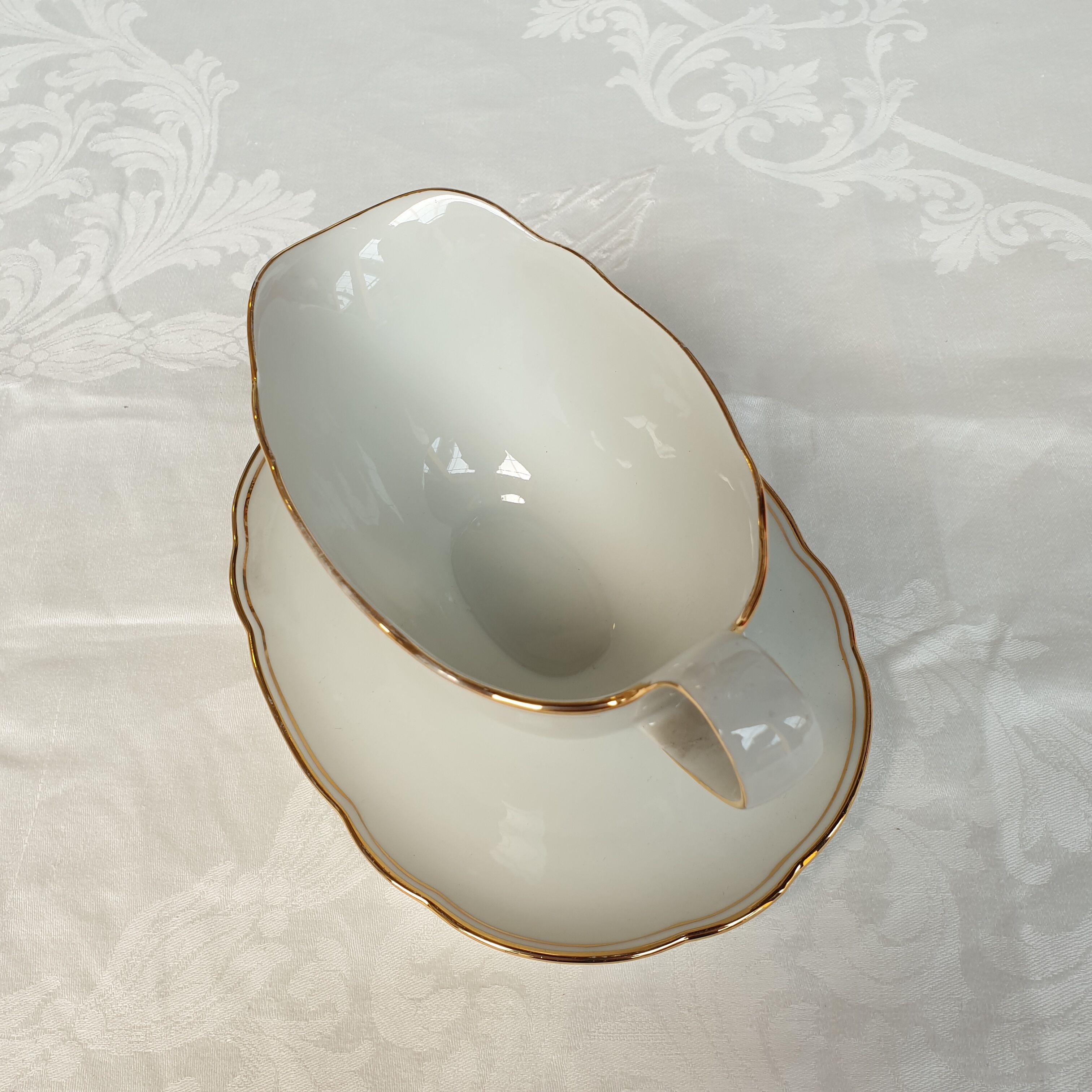 Saucière porcelaine blanche début XXème