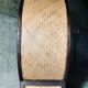 Vintage round cabinet in rattan and acacia
