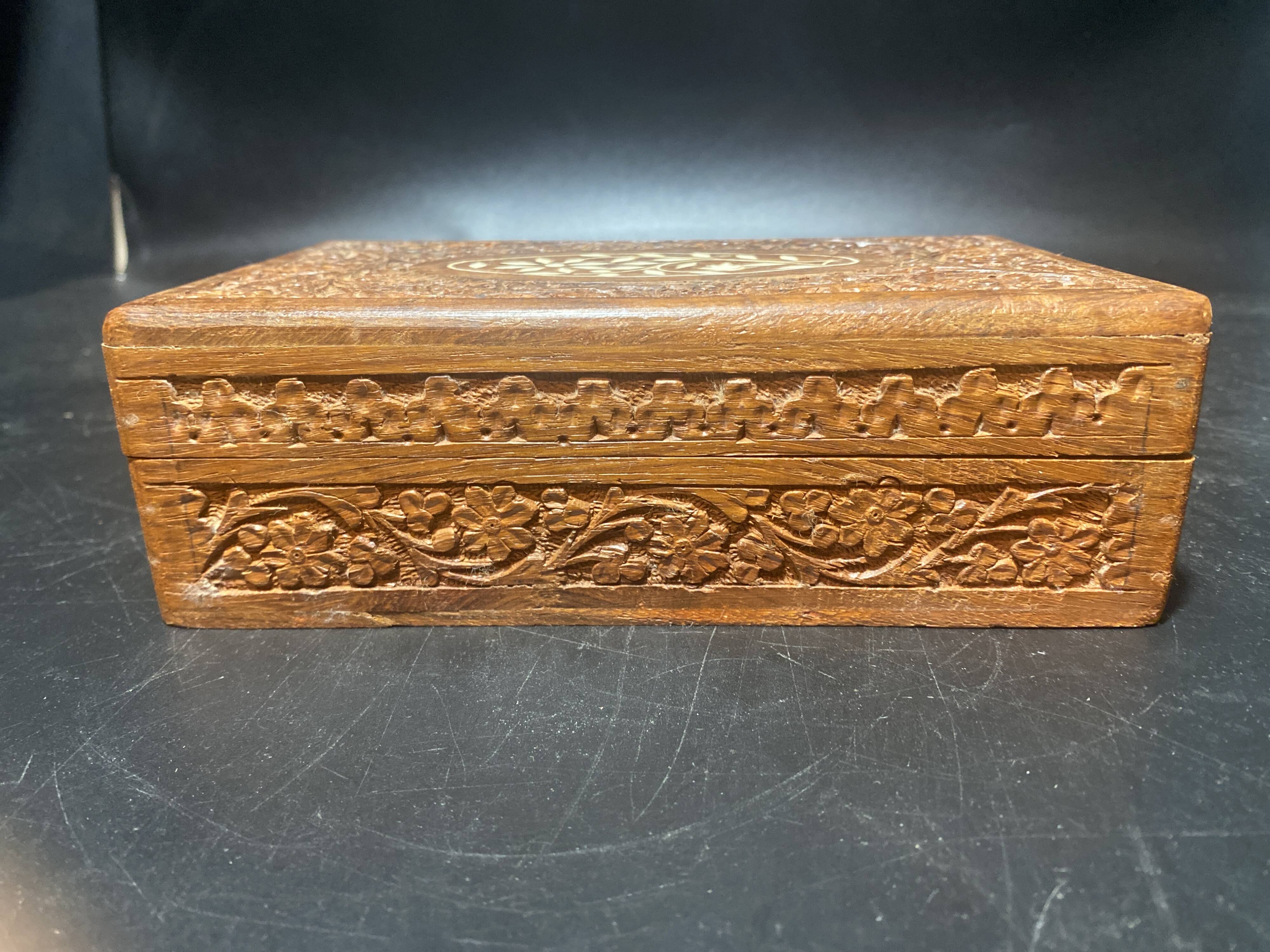 Carved wooden box