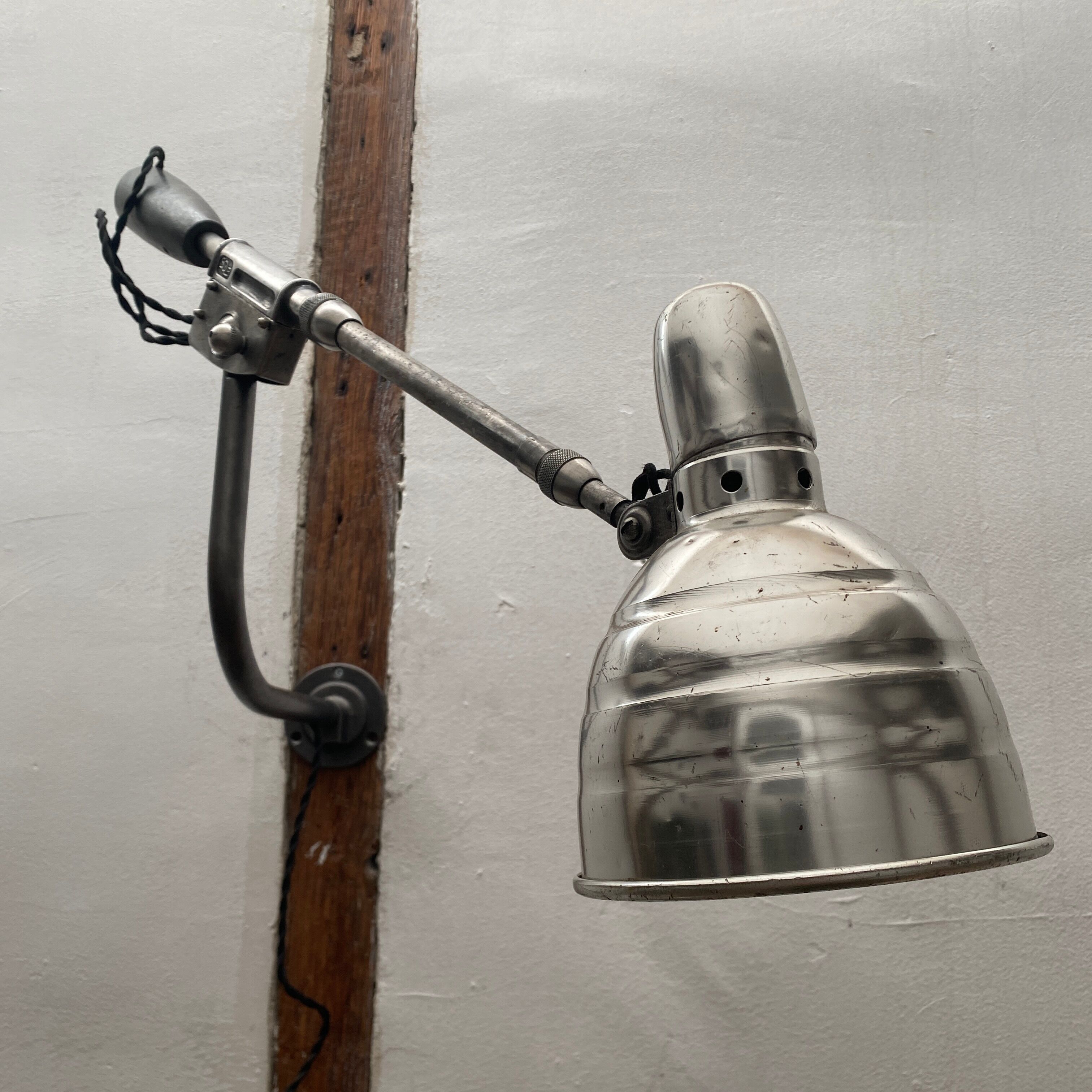Industrial counterweight wall light from Solère