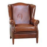 Fauteuil à oreilles en cuir de vachette cognac