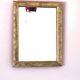 Rectangular wooden mirror with ornate Art Nouveau gold finish.