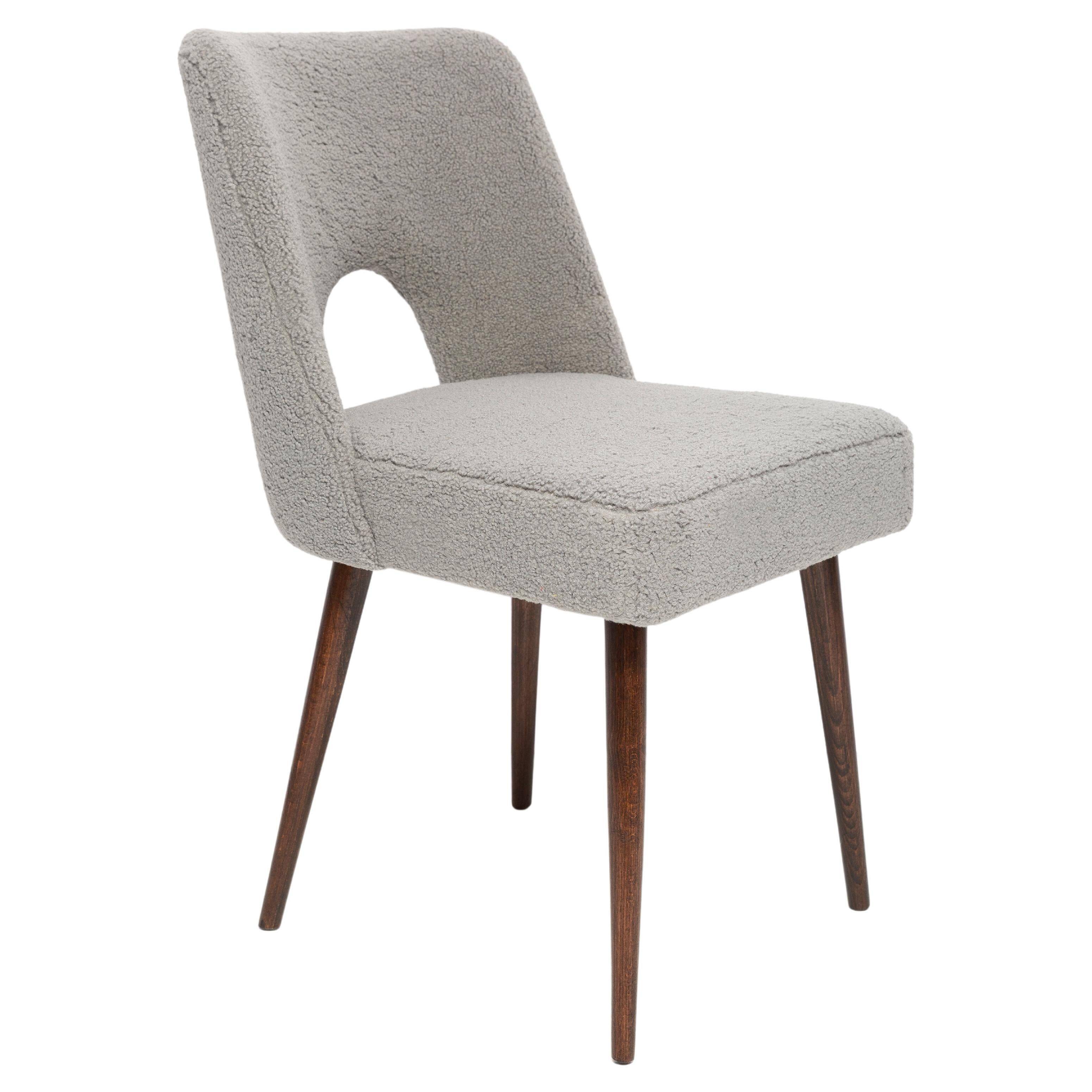 Grey boucle shell chair, dark beech wood, Poland, 1960s.